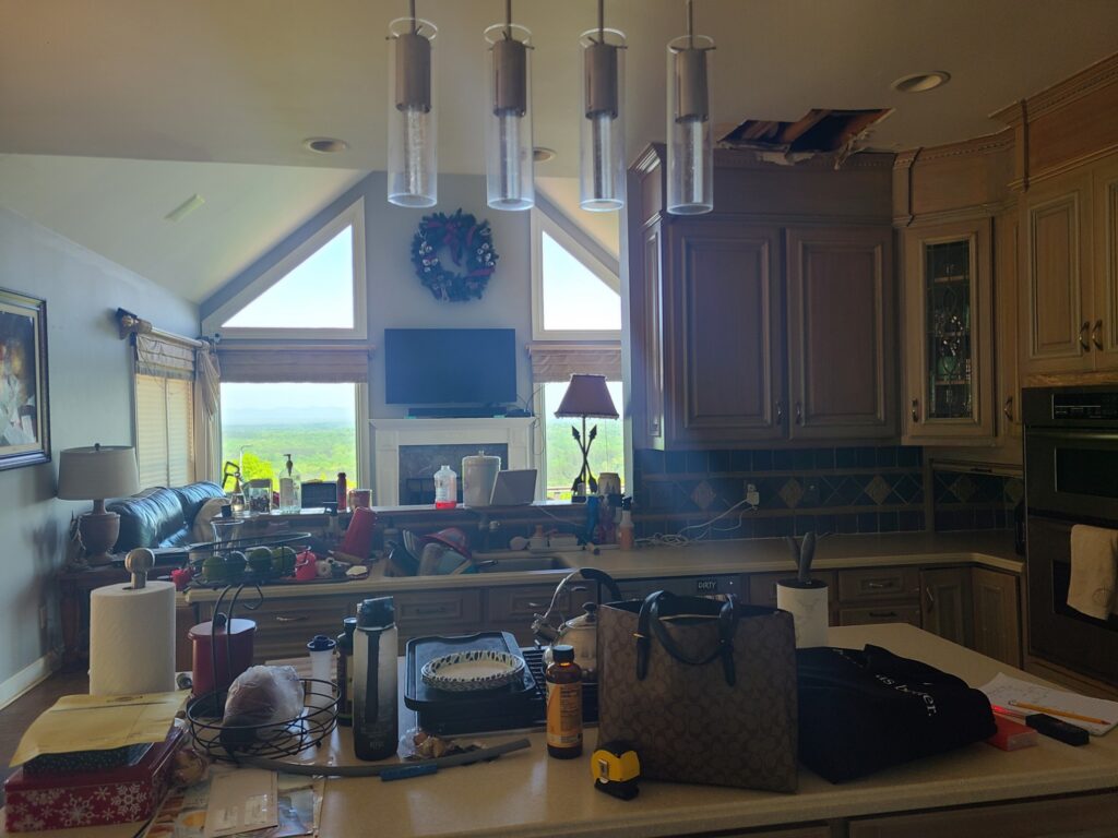 Original kitchen island looking toward the living room and mountain view