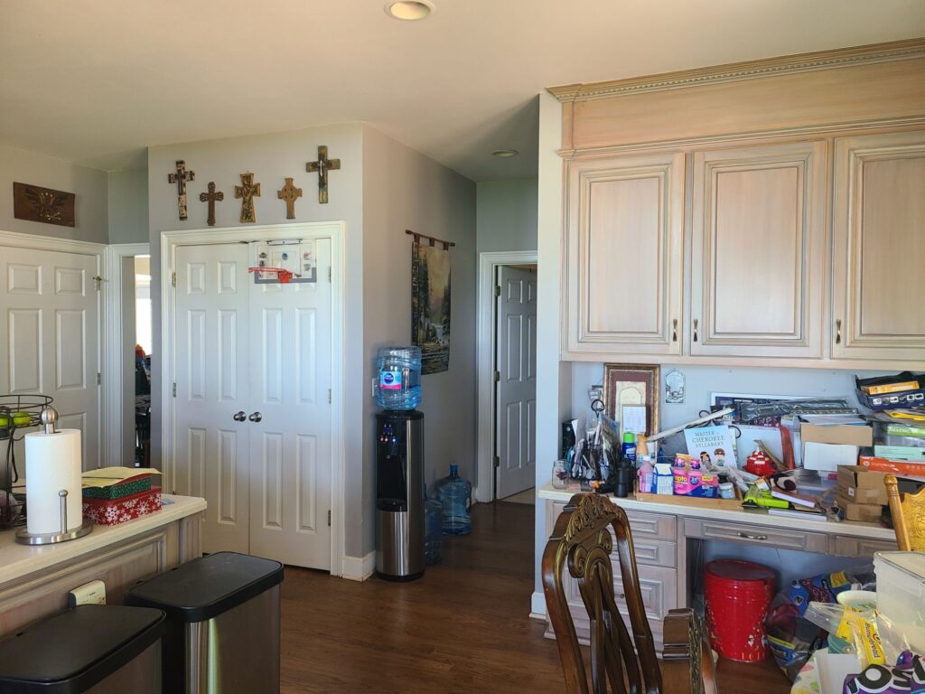 Original kitchen corner with closet doors and hallway