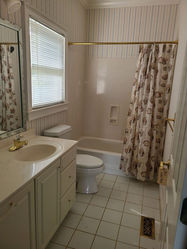 Original hall bathroom with tub