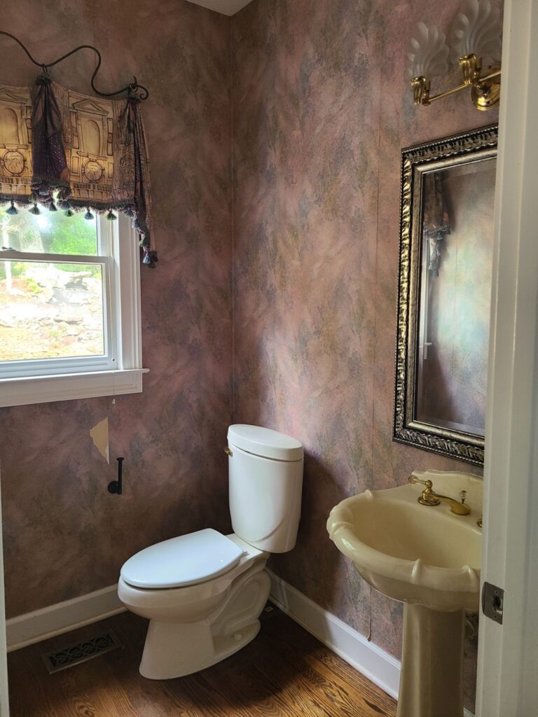 Original powder room with pedestal sink
